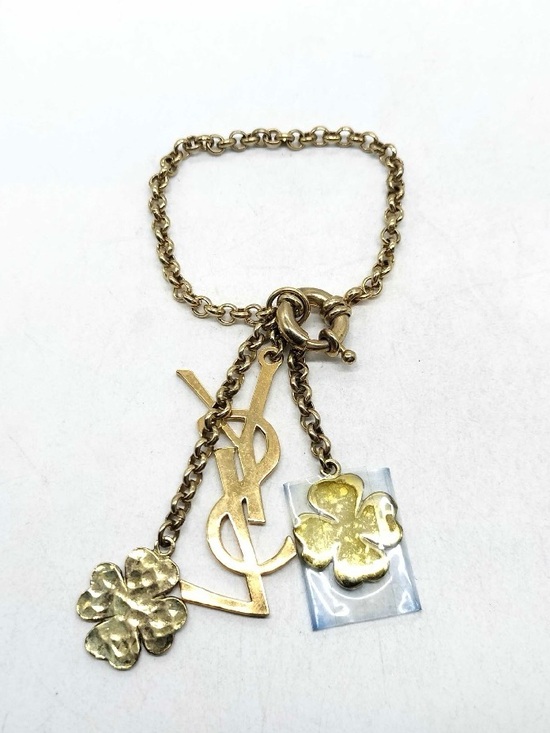 Yves Saint Laurent Jewelry - Yves Saint Laurent Gold-Tone YSL Logo and Clover Charm Bracelet